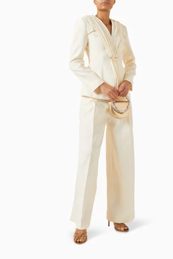 جاكيت بطيات وإبزيم غير متماثلة