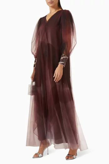 فستان طويل بتطريزات ونقشة مموجة