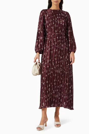 فستان بطيّات ورباط على الخصر