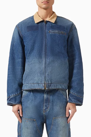 جاكيت مستوحى من أزياء العمال دينم بلون باهت