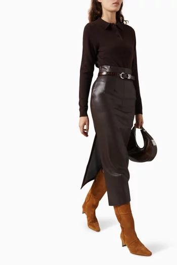 تنورة بخصر مرتفع وتصميم مقوس جلد صناعي