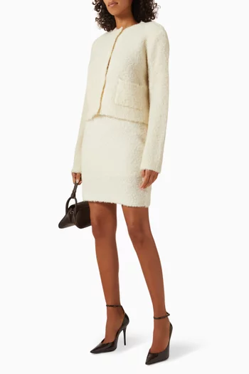 كارديغان بأزرار نسيج بوكليه