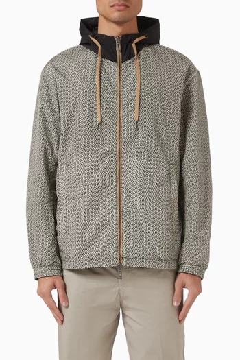 جاكيت بغطاء رأس وسحّاب