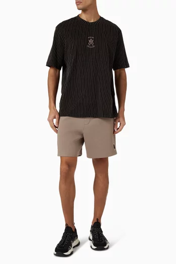 تي شيرت مزين بشعار الماركة قطن