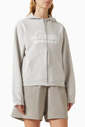 كنزة بغطاء رأس مطرزة بشعار Luxury‏ وسحّاب صوف سريع الجفاف