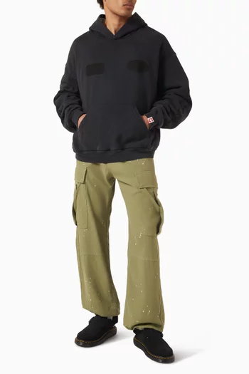 كنزة بغطاء رأس عازلة للحرارة مزينة برقعة ولون باهت