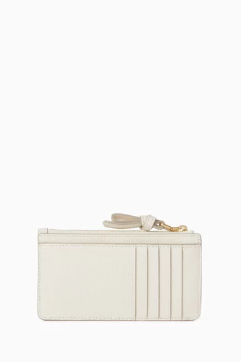 حافظة بطاقات لوب إيست/ويست بسحّاب جلد