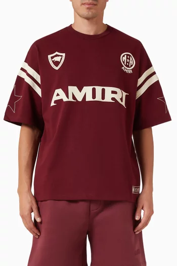 تي شيرت بقصة فضفاضة وطبعات رياضية قطن