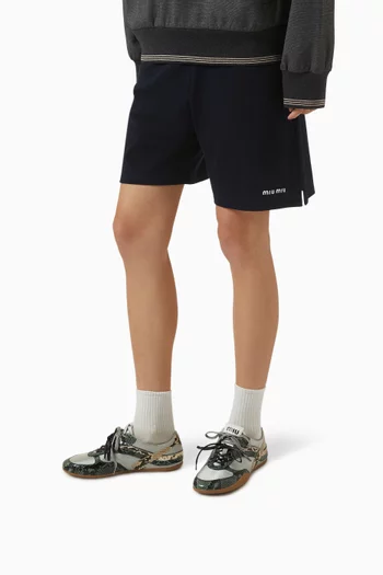 سنيكرز جمنازيوم قماش معالج وجلد أيرز