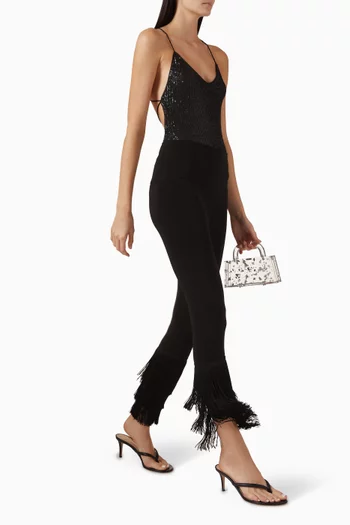 لغينغز بحواف قصيرة ومطرزة بشرّابات