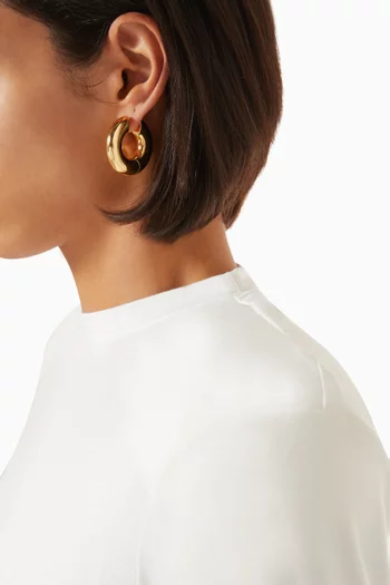 Thick Huggie Earings in 14kt Gold-plated Brass