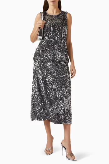 بلوزة ليلي بفتحة رقبة على شكل دمعة مزينة بتطريزات بالترتر