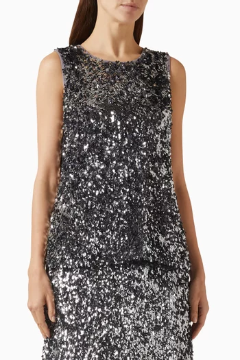 بلوزة ليلي بفتحة رقبة على شكل دمعة مزينة بتطريزات بالترتر