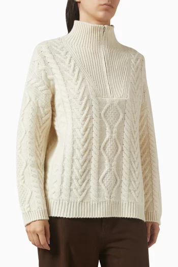 سترة منسوجة بغرزة الضفيرة