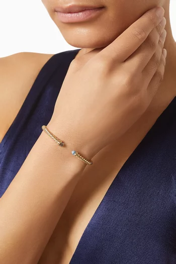 سوار كابل سبيرا بتصميم مرن مرصع بتوباز ذهب عيار 18