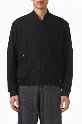 جاكيت مطرز بشعار الماركة على الصدر قماش شبكي