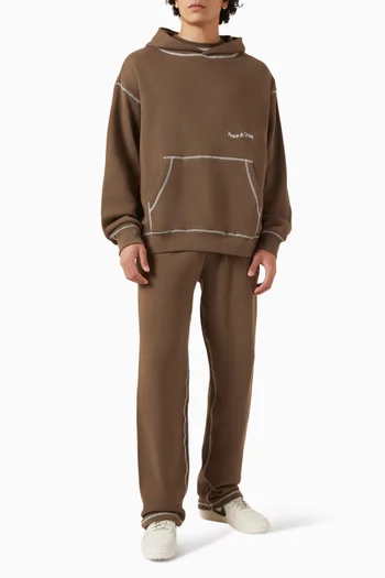 كنزة بغطاء رأس بحياكة معكوسة وشعار الماركة قطن