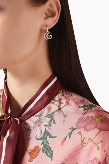 أقراط مارمونت بشعار حرفي GG مرصعة بالكريستال ‏نحاس