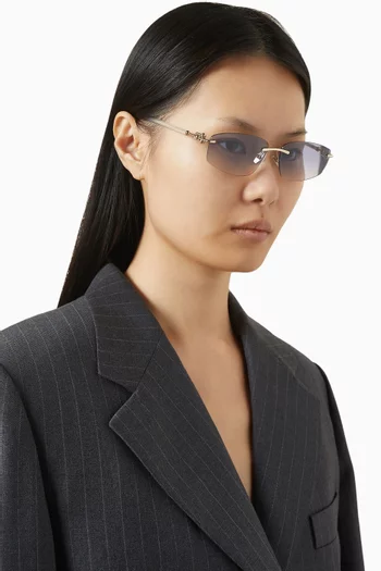 نظارة شمسية بإطار غير منتظم معدن بلون ذهبي