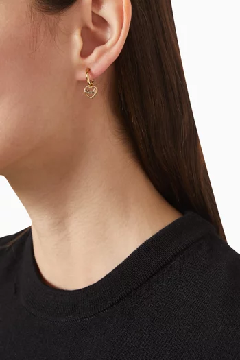 أقراط هاجي بتصميم قلب بشعار الماركة نحاس مطلي