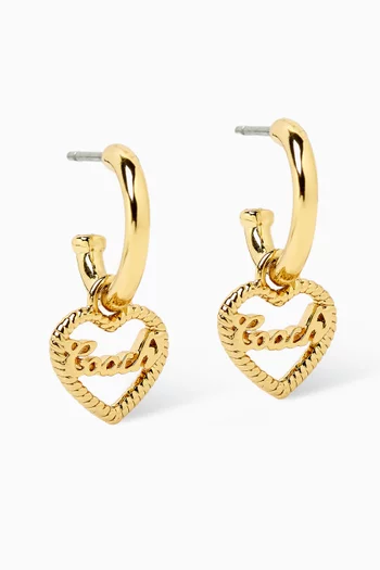 أقراط هاجي بتصميم قلب بشعار الماركة نحاس مطلي