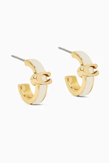 أقراط هاجي مطلية بالمينا بشعار الماركة نحاس مطلي