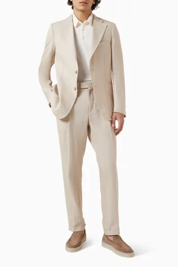 بنطال أنيق بقصة تضيق باتجاه الحافة كتان