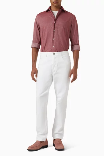 بنطال جينز بقصة قصة ساق تضيق نحو الحافة دينم