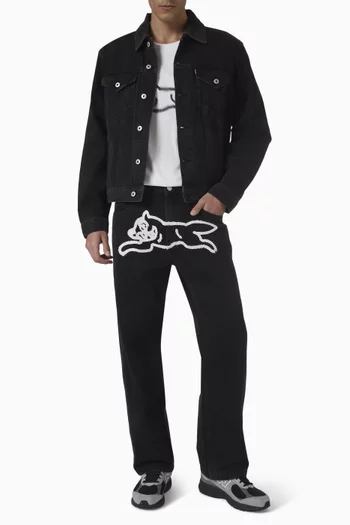 بنطال جينز بطبعة كلب يجري بطلاء بخاخ دينم