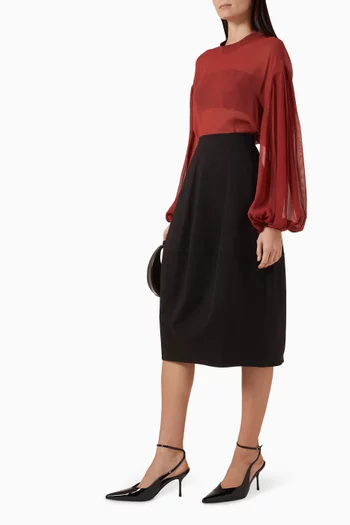 بلوزة بأكمام منفوخة شفافة