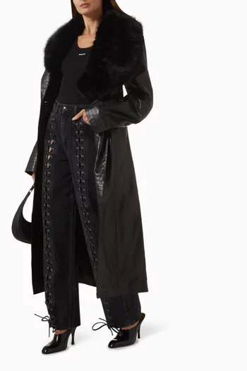 بنطال جينز بقصة ساق واسعة بأربطة دينم