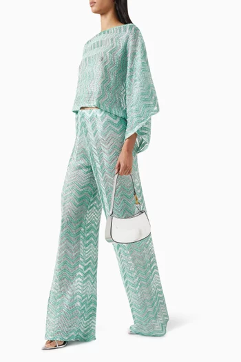 بلوزة بنقشة خطوط متعرجة