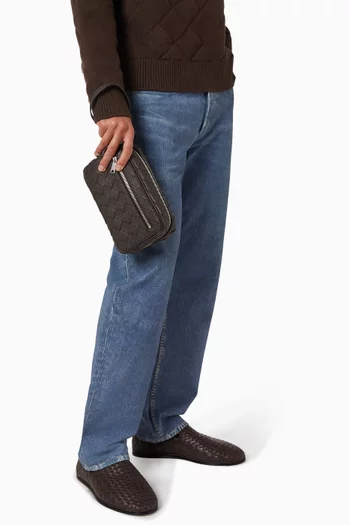 حقيبة صغيرة بحمالة معصم جلد عجل مجدول