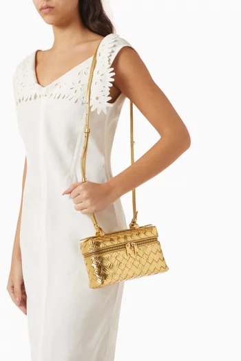 حقيبة مستحضرات تجميل بانج بانج جلد لامع مجدول