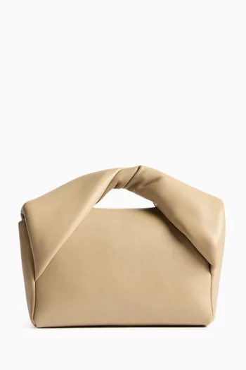 حقيبة متوسطة بيد علوية ملفوفة جلد