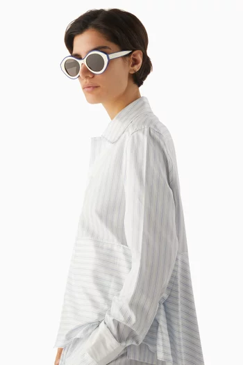 نظارة شمسية بألوان مغايرة وإطار دائري أسيتات