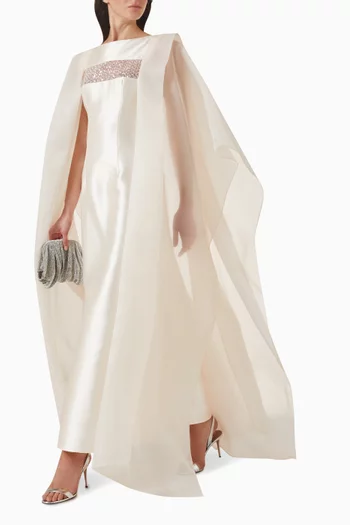 فستان سهرة بجزء مزين بتطريزات ستان