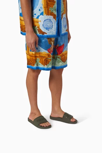 Logo Slides in Rubber