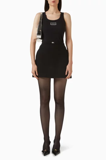 بلوزة بلا أكمام بشعار الماركة نسيج مضلع