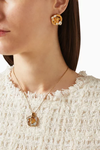 أقراط بشعار ميدوسا مرصعة بالكريستال معدن