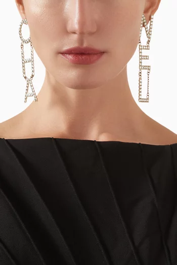 2019s Mismatched Statement Earrings