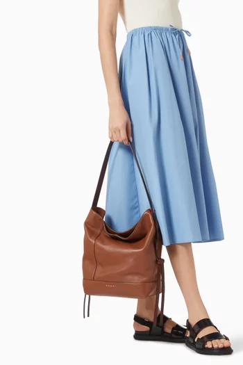 حقيبة ساك بشعار الماركة جلد