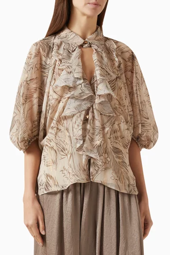 بلوزة مزينة بنقشة وكشكش