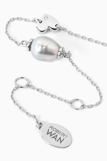 سوار مزين بحلية قلب ولؤلؤ ذهب عيار 18