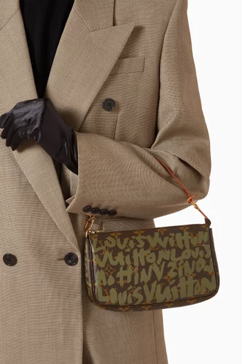 حقيبة إكسسوارات بوشيت بنقشة غرافيتي