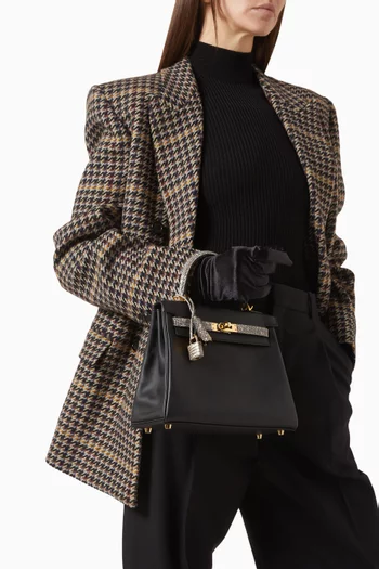 Kelly 25 Top-handle Bag in Swift Leather