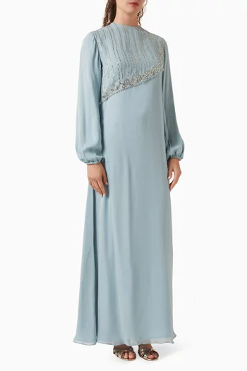 فستان مزين بتطريزات بالخرز