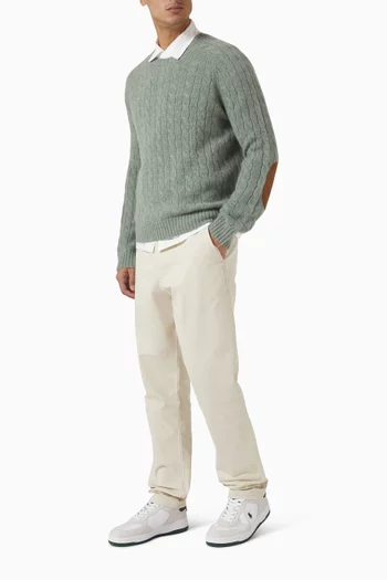 سترة منسوجة بغرزة الضفيرة