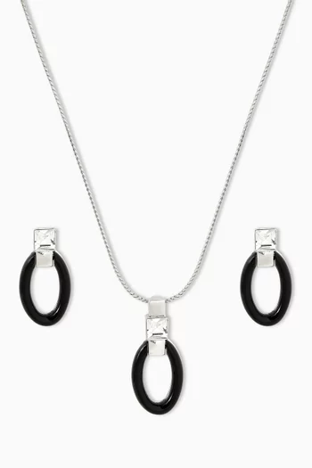 طقم قلادة وأقراط بتصميم بيضاوي فينتج من الثمانينات فضة مطلية بالروديوم