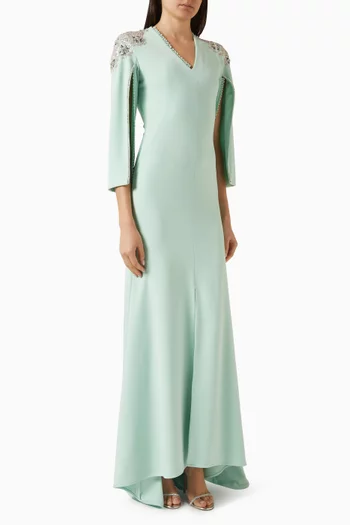 فستان مزين بتطريزات بالخرز